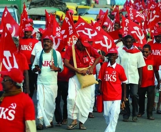 అమెరికాతో ట్రేడ్ డీల్ రద్దు చేయాలి: AIKS