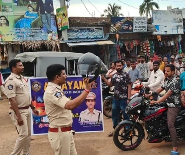 ద్విచక్ర వాహనదారులకు హెల్మెట్ తప్పనిసరి - Udayam Digital